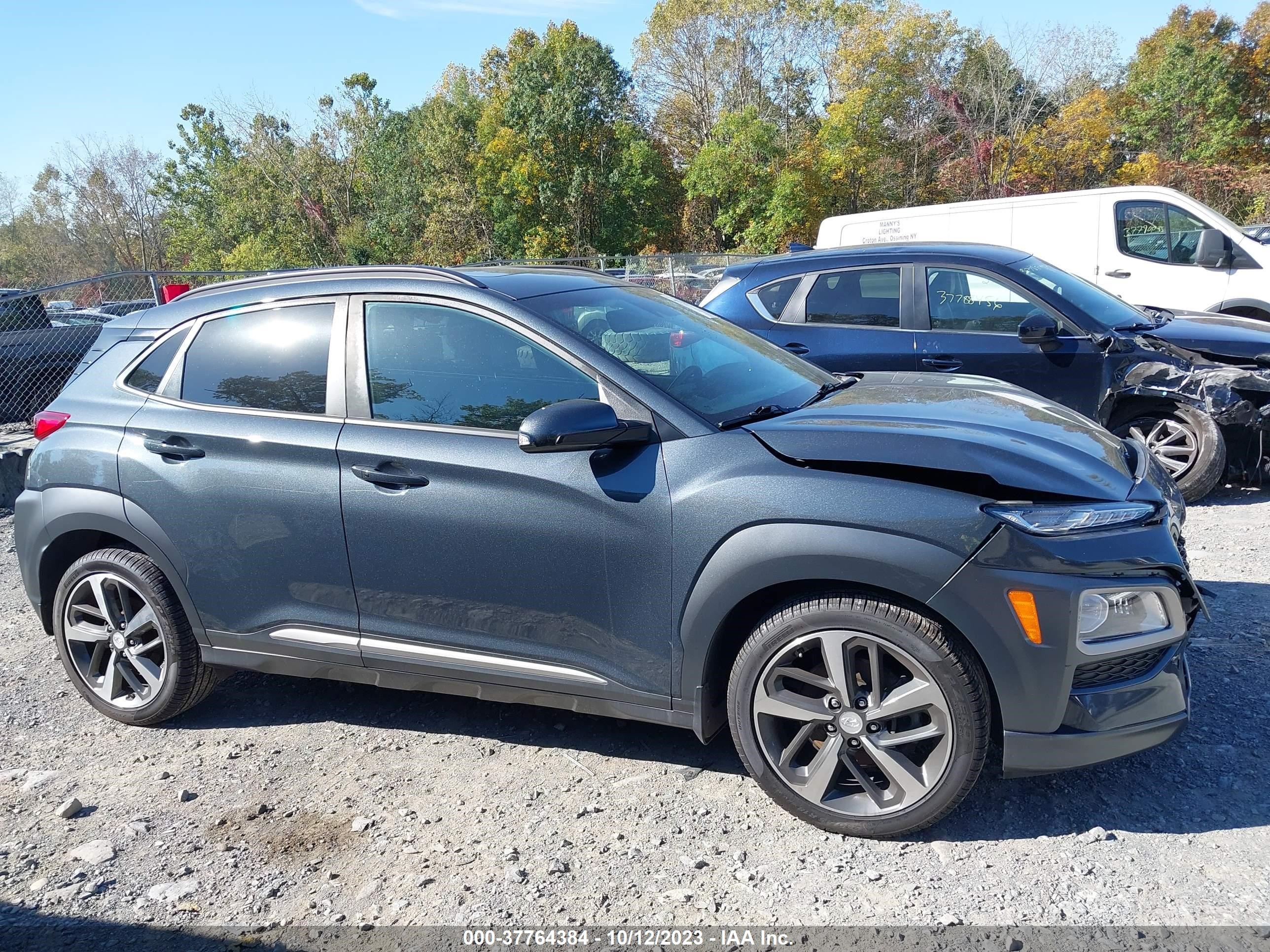 Photo 12 VIN: KM8K5CA53KU262429 - HYUNDAI KONA 