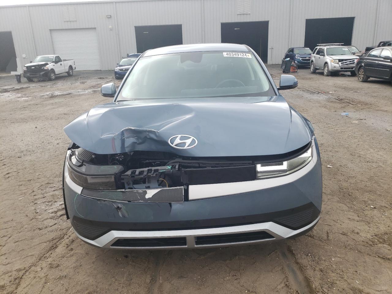 Photo 4 VIN: KM8KN4AEXNU067714 - HYUNDAI IONIQ 