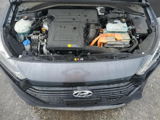 Photo 10 VIN: KMHC65LC8JU084525 - HYUNDAI IONIQ BLUE 