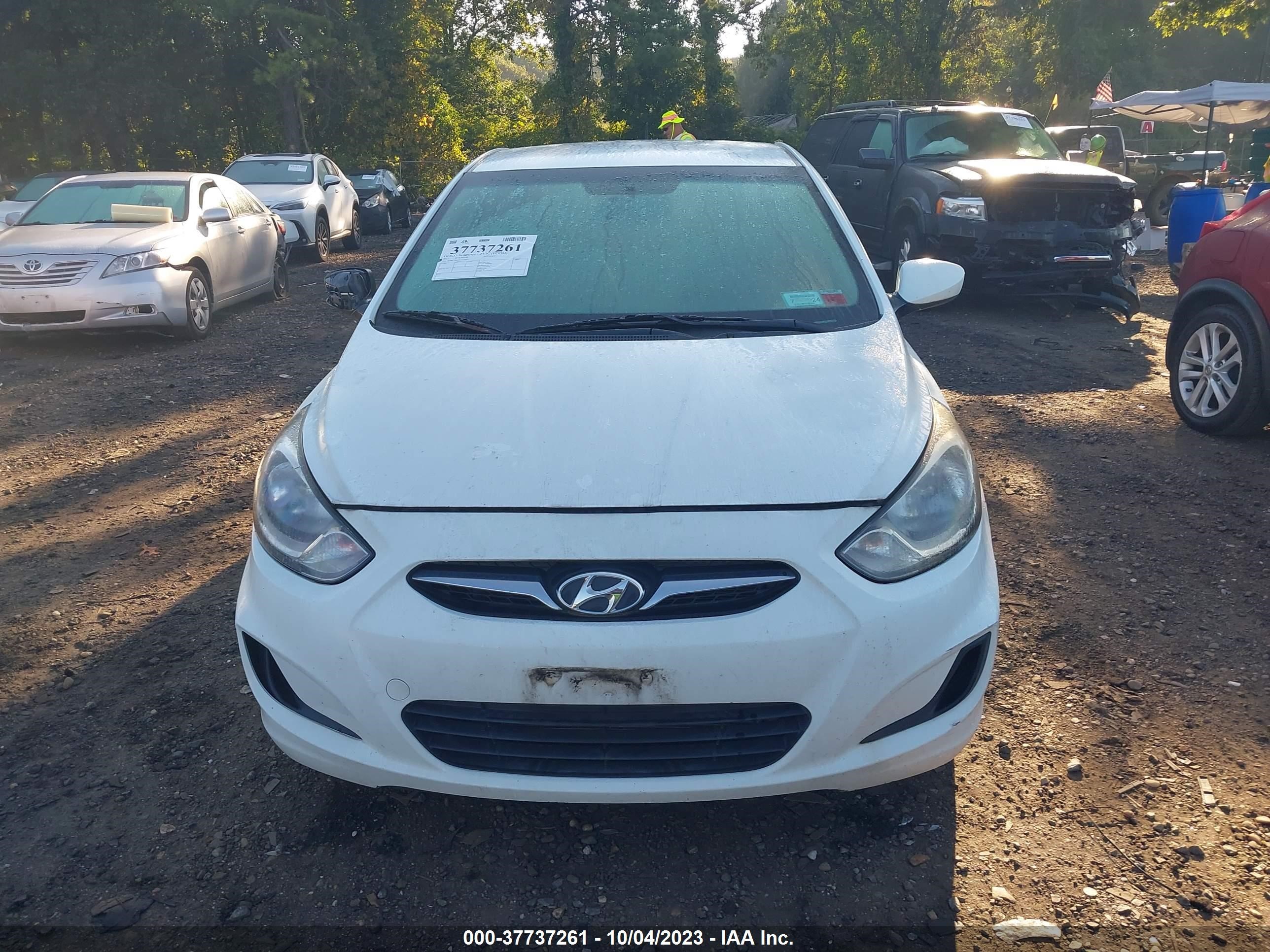 Photo 11 VIN: KMHCT4AE9CU177581 - HYUNDAI ACCENT 