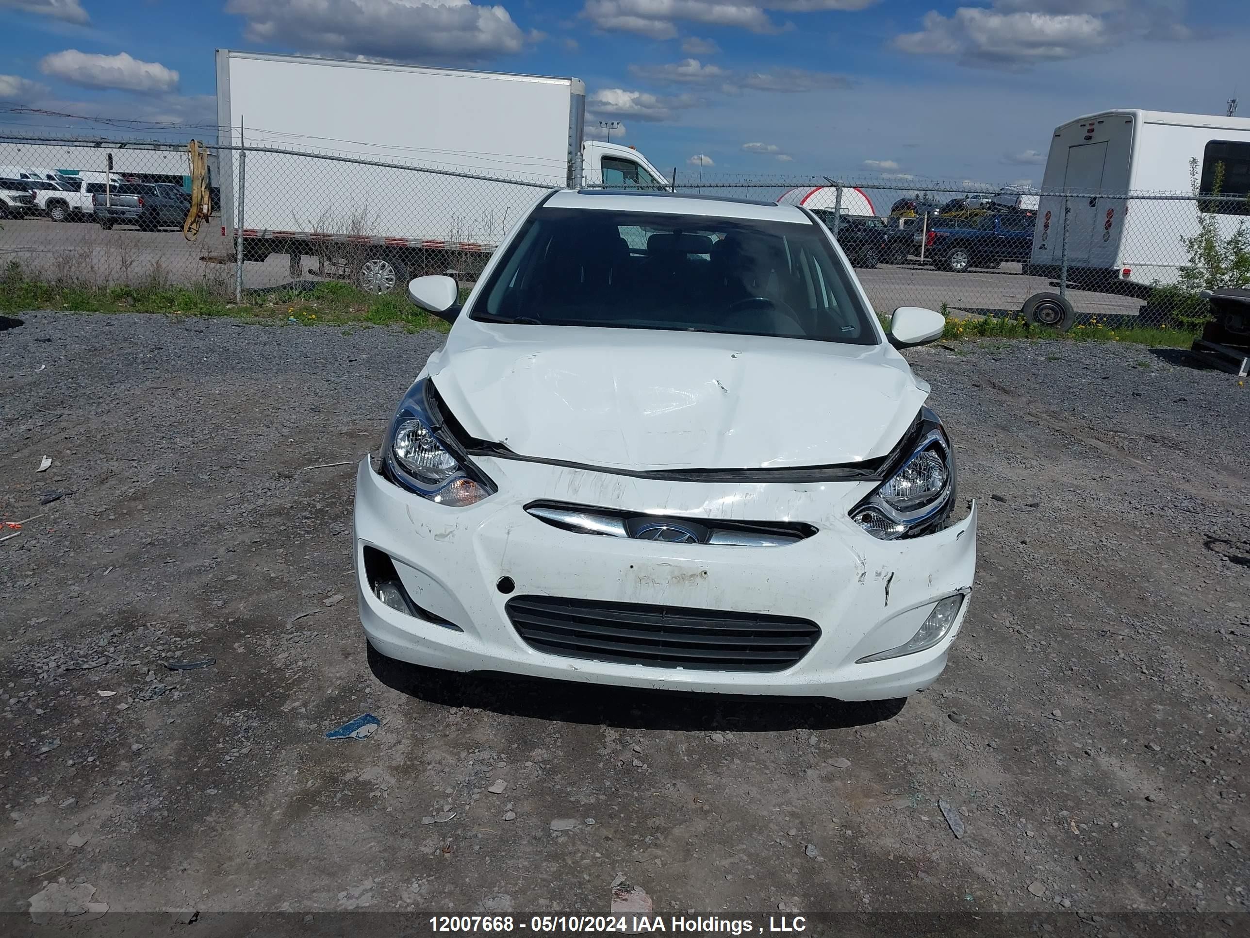 Photo 11 VIN: KMHCU5AE6EU197437 - HYUNDAI ACCENT 