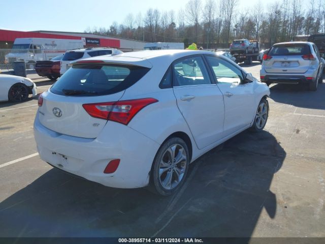 Photo 3 VIN: KMHD35LE2DU044525 - HYUNDAI ELANTRA GT 