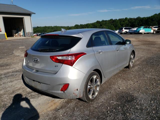 Photo 3 VIN: KMHD35LE4DU047457 - HYUNDAI ELANTRA GT 