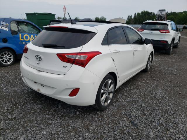 Photo 3 VIN: KMHD35LE4DU084072 - HYUNDAI ELANTRA GT 