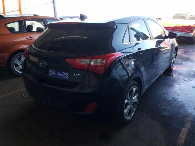 Photo 3 VIN: KMHD35LE8DU111807 - HYUNDAI ELANTRA GT 