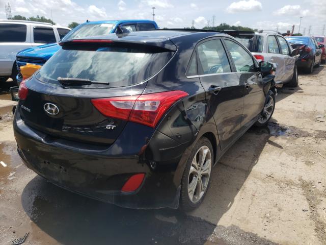 Photo 3 VIN: KMHD35LE9DU044652 - HYUNDAI ELANTRA GT 