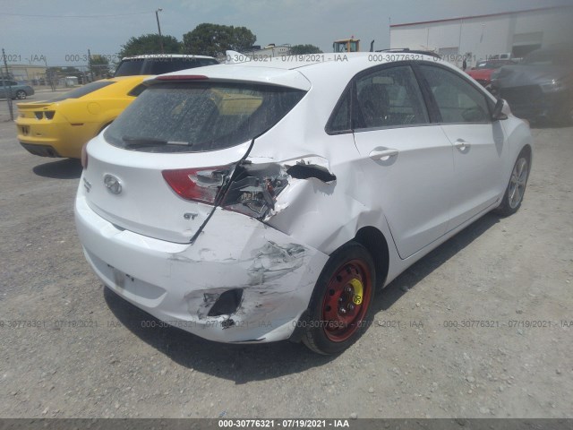 Photo 5 VIN: KMHD35LE9DU084245 - HYUNDAI ELANTRA GT 