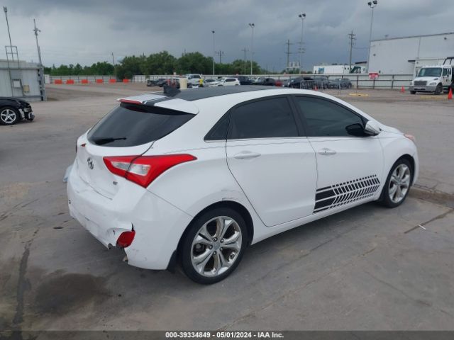 Photo 3 VIN: KMHD35LH1EU174047 - HYUNDAI ELANTRA GT 