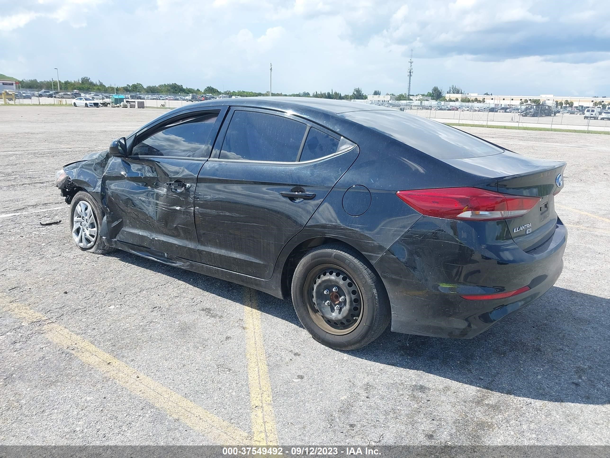 Photo 2 VIN: KMHD74LF8JU611551 - HYUNDAI ELANTRA 