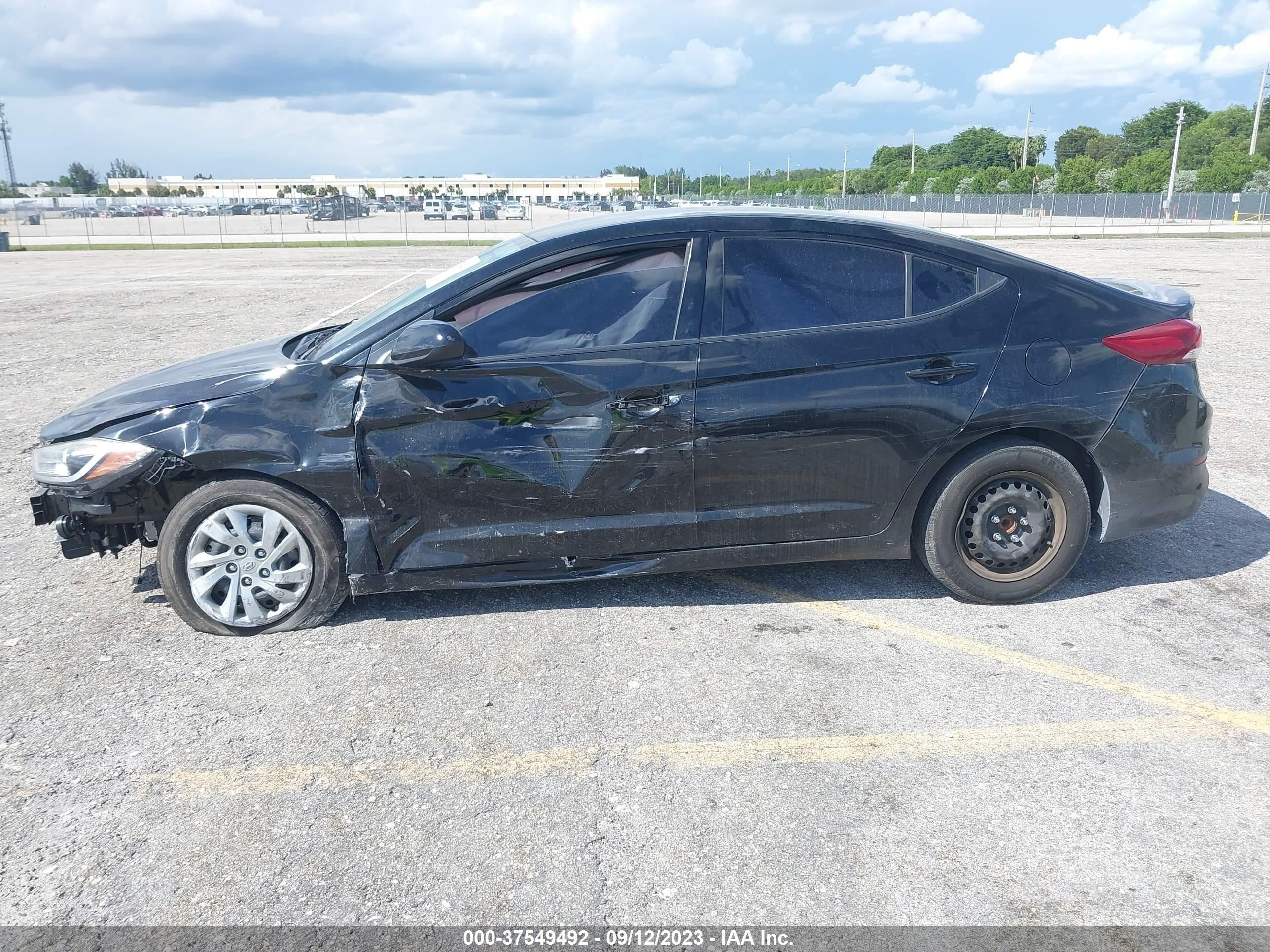 Photo 5 VIN: KMHD74LF8JU611551 - HYUNDAI ELANTRA 