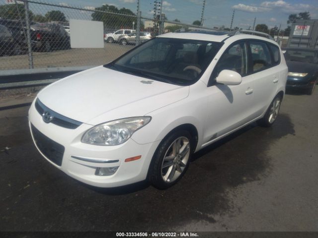 Photo 1 VIN: KMHDC8AE9CU158332 - HYUNDAI ELANTRA TOURING 