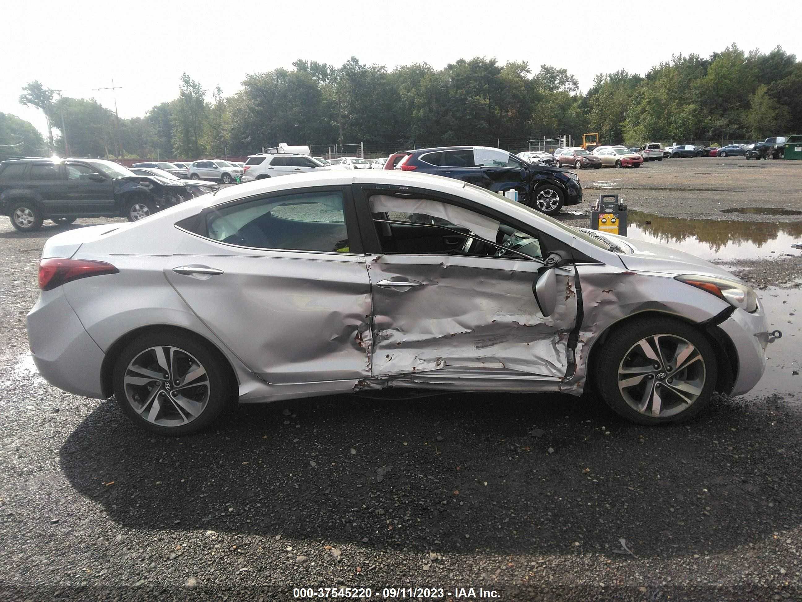 Photo 12 VIN: KMHDH4AE1EU114628 - HYUNDAI ELANTRA 