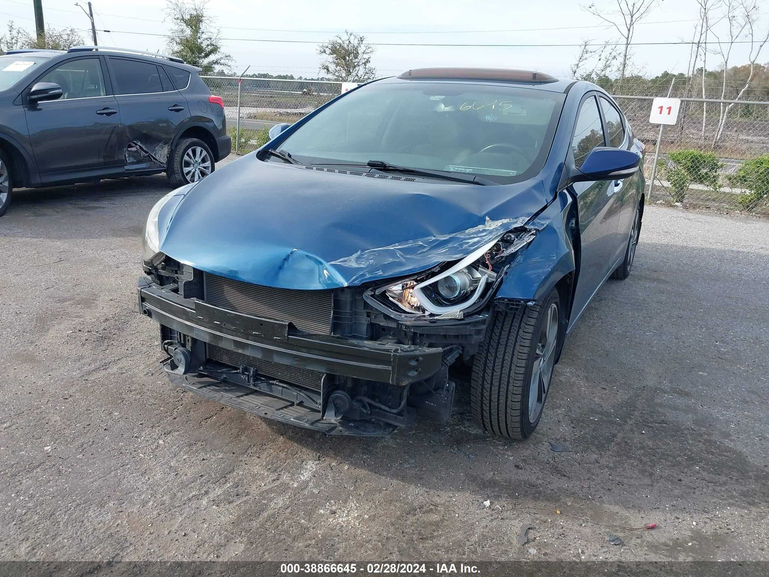 Photo 5 VIN: KMHDH4AE2EU032195 - HYUNDAI ELANTRA 