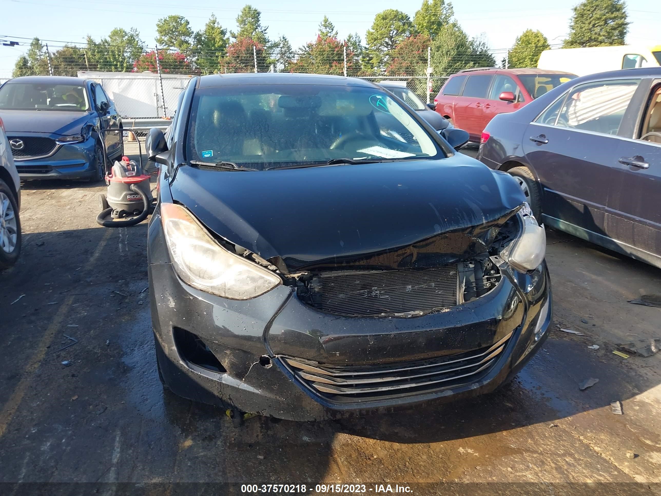 Photo 12 VIN: KMHDH4AE3DU614398 - HYUNDAI ELANTRA 