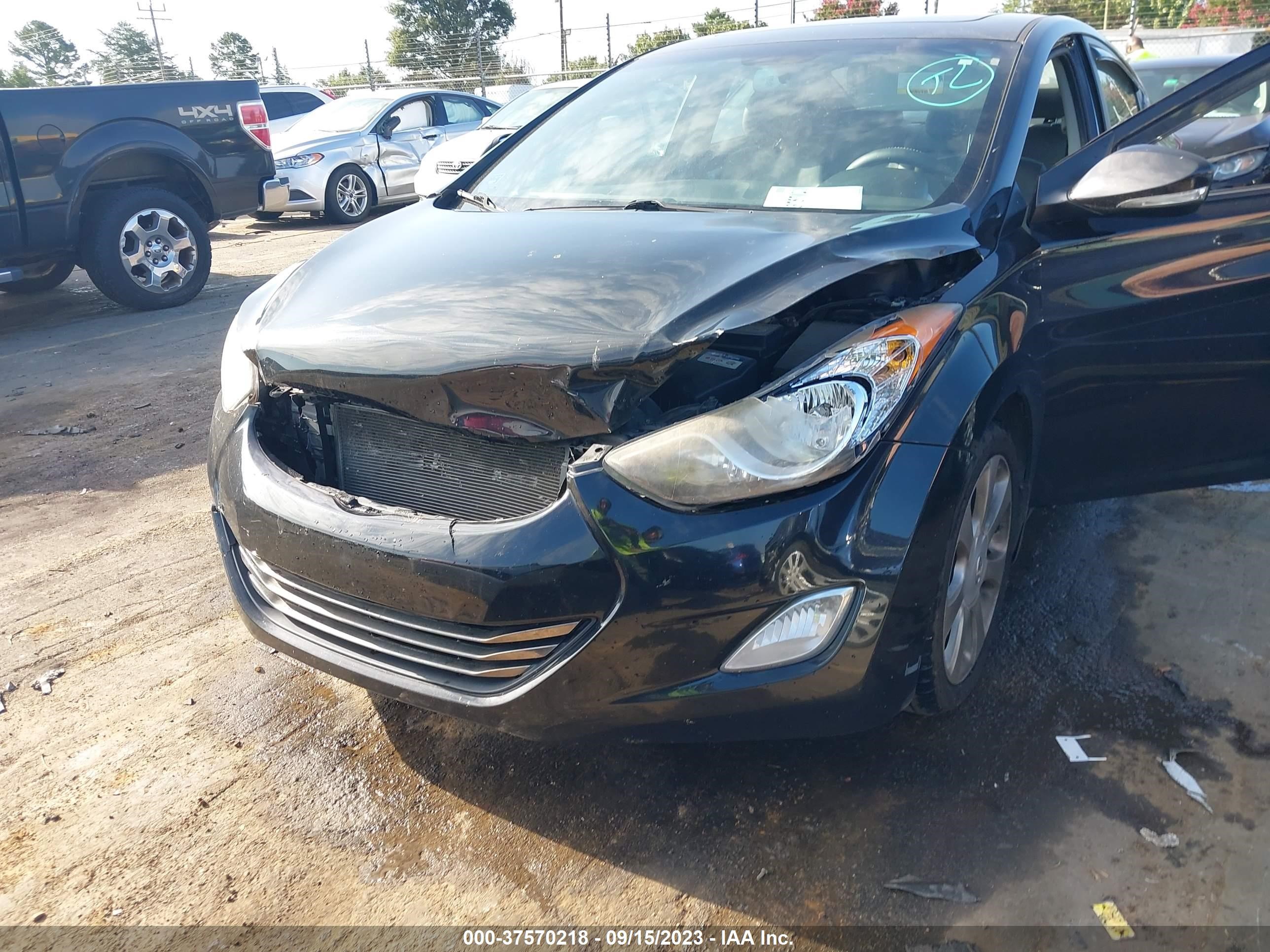 Photo 5 VIN: KMHDH4AE3DU614398 - HYUNDAI ELANTRA 