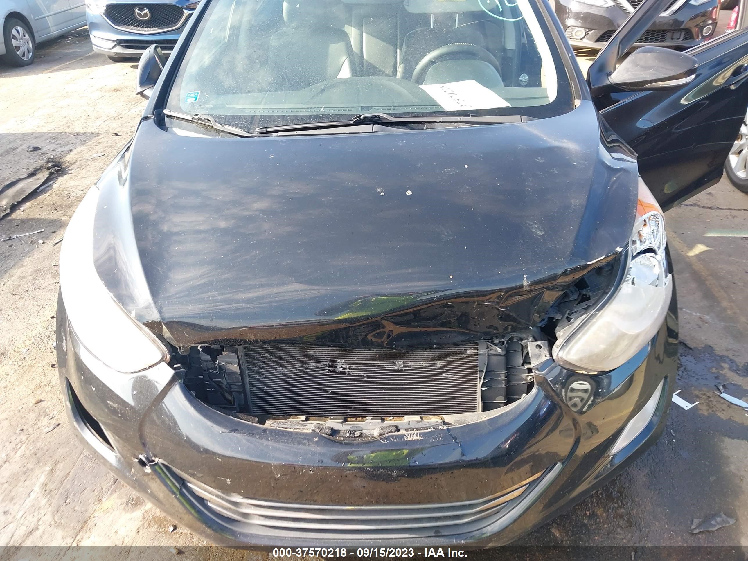 Photo 9 VIN: KMHDH4AE3DU614398 - HYUNDAI ELANTRA 