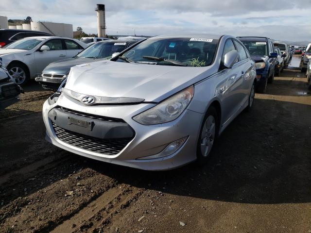 Photo 1 VIN: KMHEC4A41CA055900 - HYUNDAI SONATA HYB 