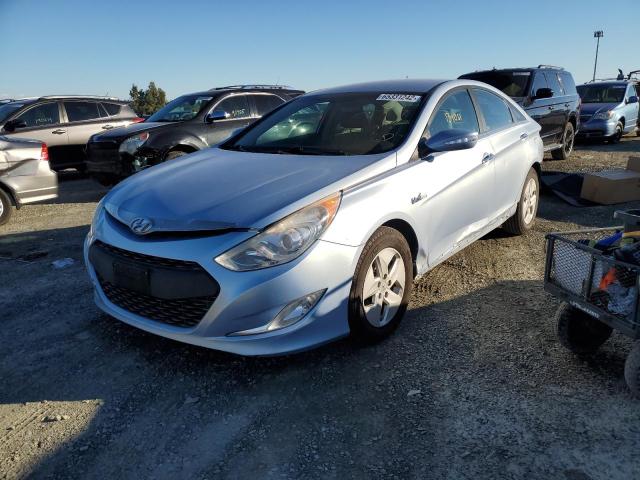 Photo 1 VIN: KMHEC4A45CA062557 - HYUNDAI SONATA HYB 