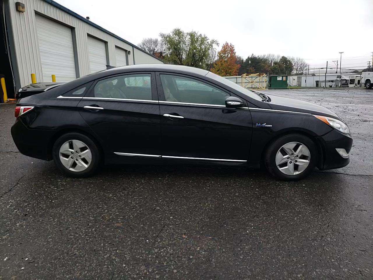 Photo 10 VIN: KMHEC4A47CA055870 - HYUNDAI SONATA HYB 