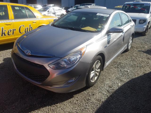 Photo 1 VIN: KMHEC4A4XCA033684 - HYUNDAI SONATA HYB 