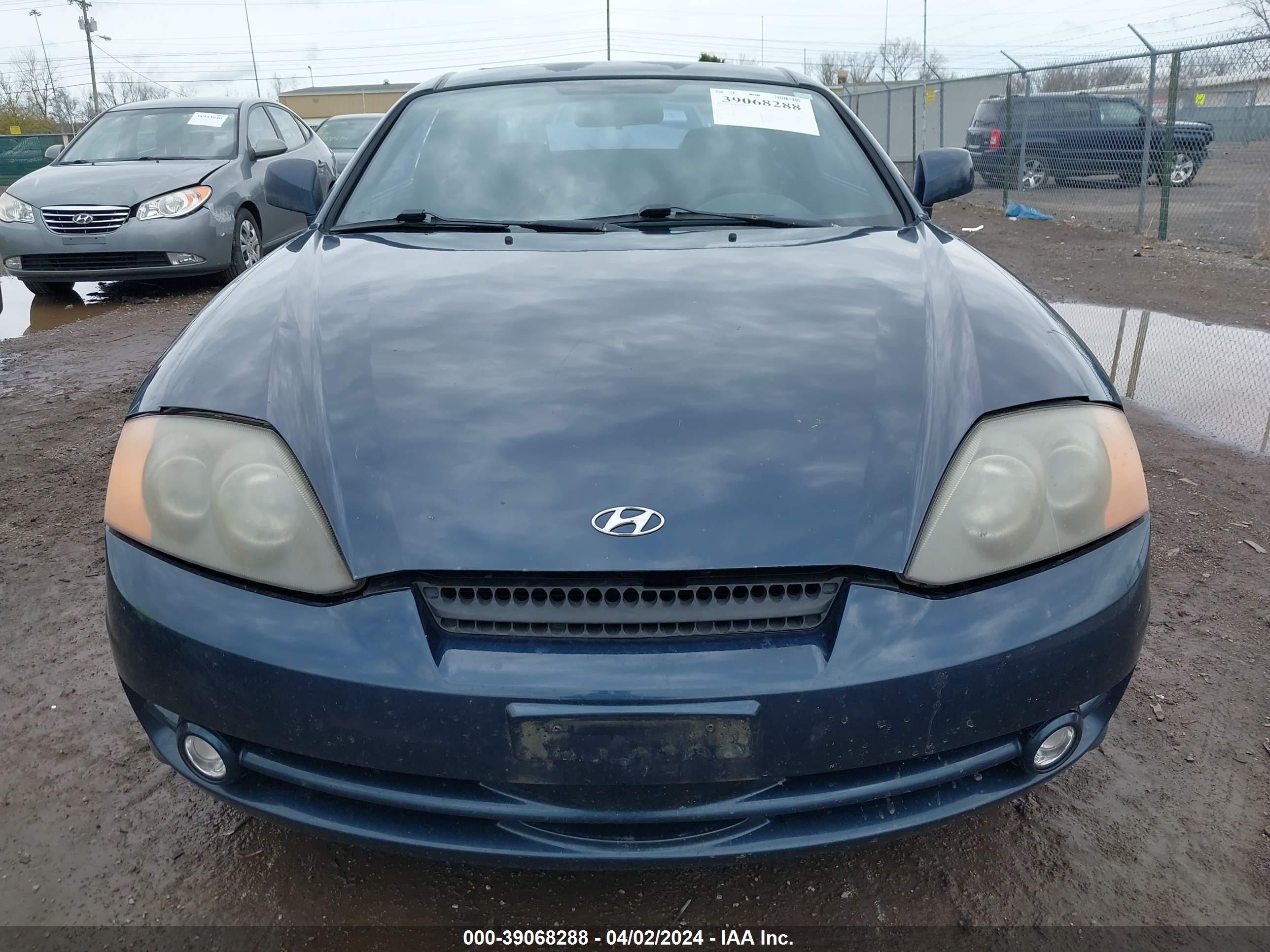 Photo 11 VIN: KMHHM65DX3U062567 - HYUNDAI TIBURON 