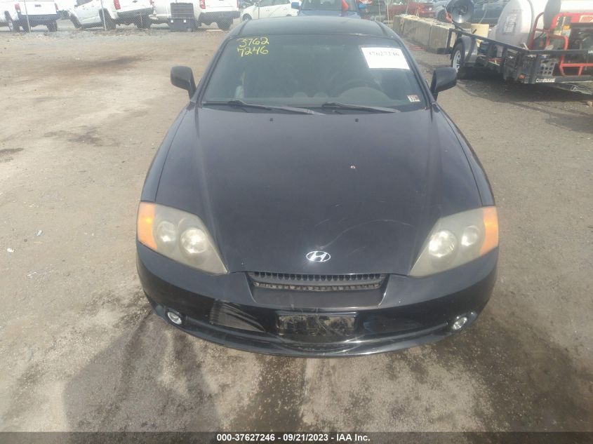 Photo 11 VIN: KMHHN65F04U144887 - HYUNDAI TIBURON 