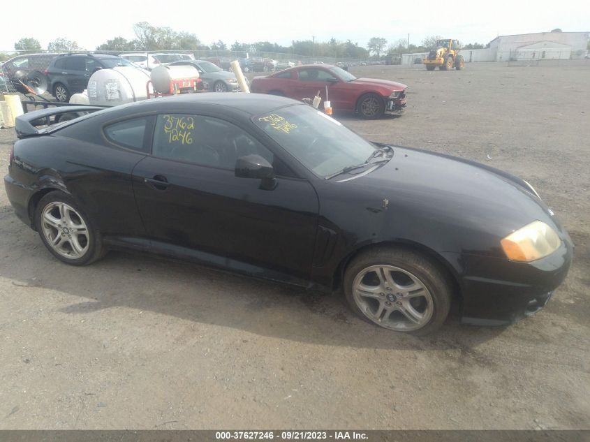 Photo 12 VIN: KMHHN65F04U144887 - HYUNDAI TIBURON 