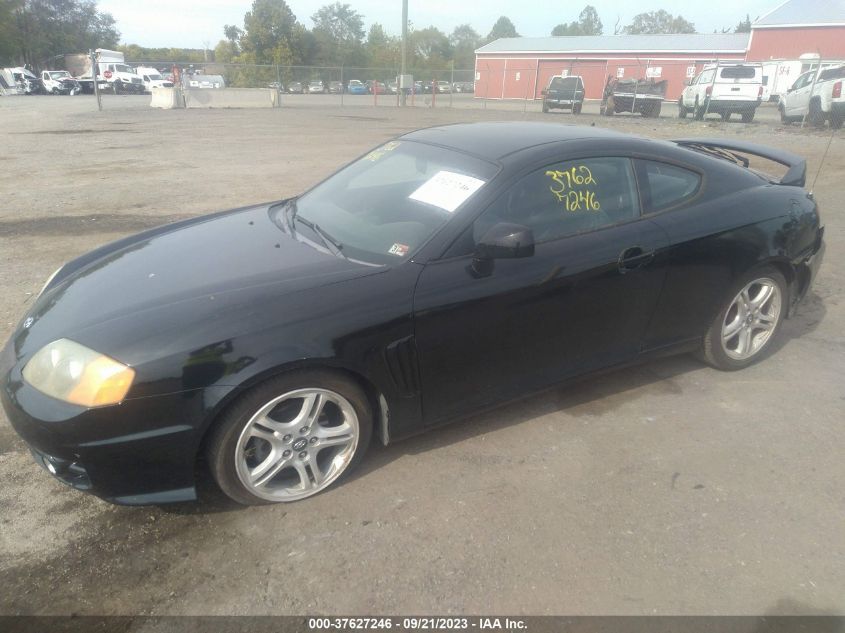 Photo 13 VIN: KMHHN65F04U144887 - HYUNDAI TIBURON 