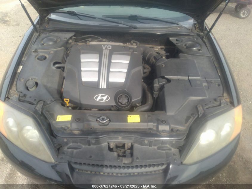 Photo 9 VIN: KMHHN65F04U144887 - HYUNDAI TIBURON 