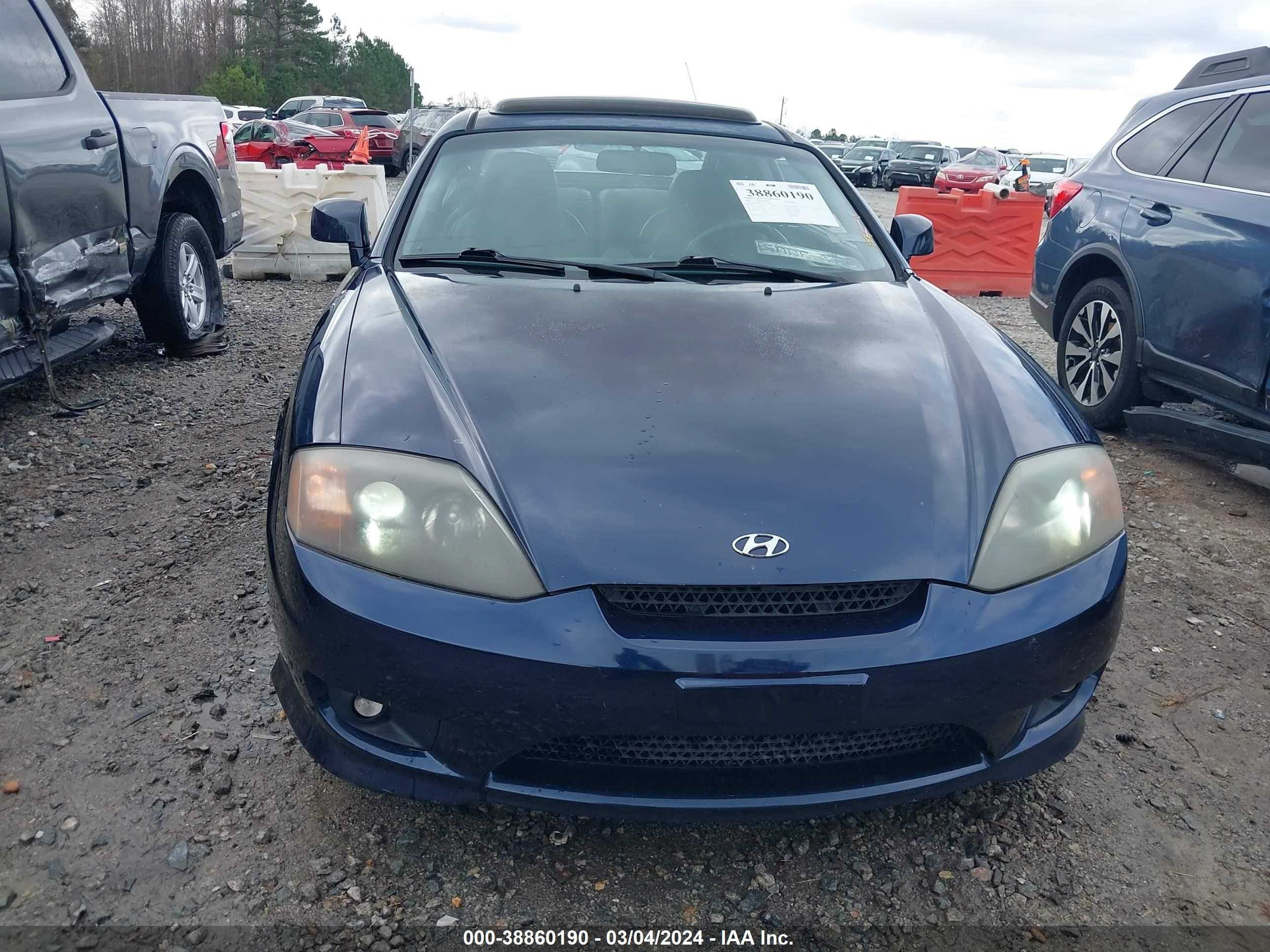 Photo 11 VIN: KMHHN65F35U169705 - HYUNDAI TIBURON 