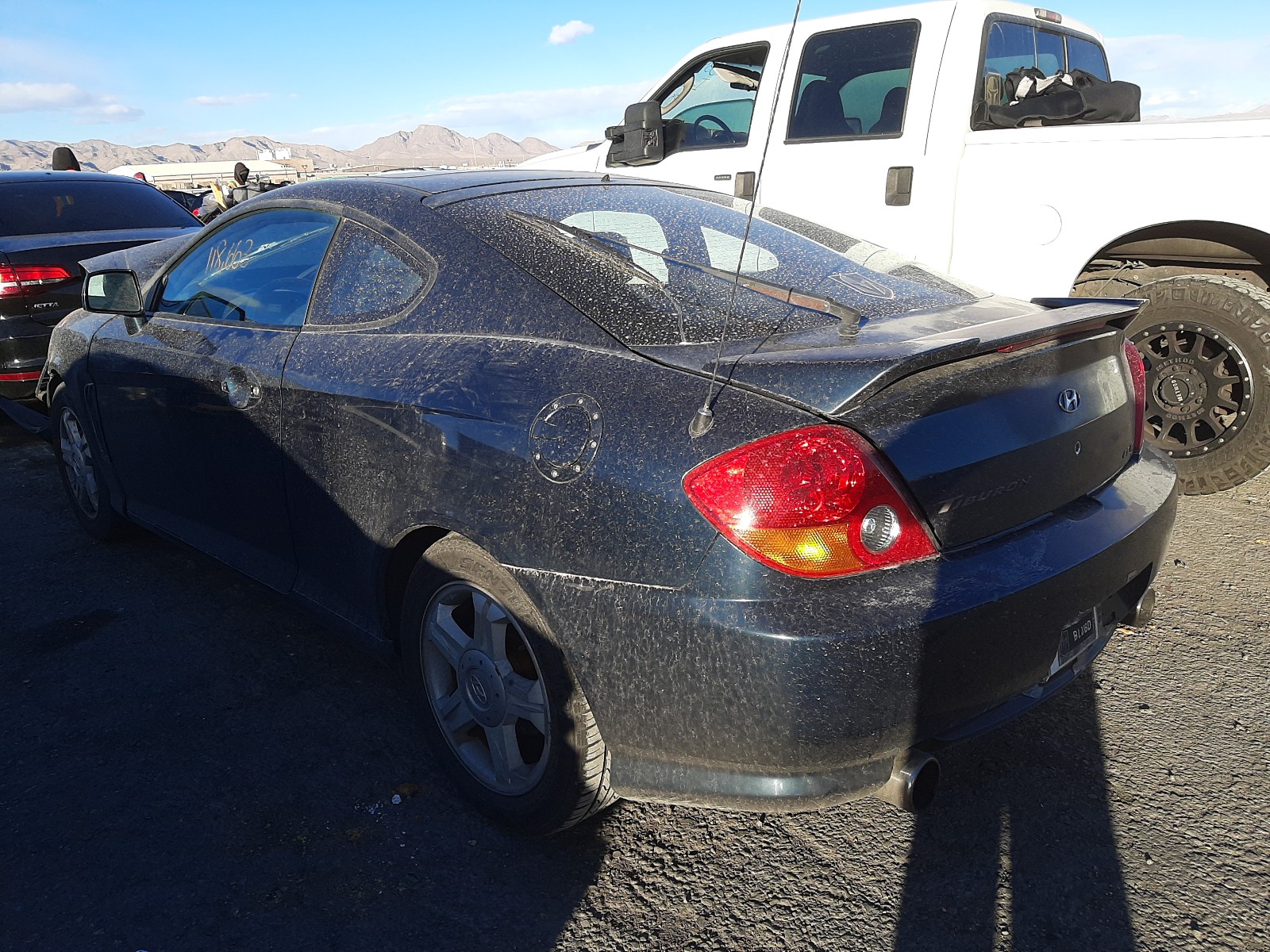 Photo 2 VIN: KMHHN65FX3U013027 - HYUNDAI TIBURON GT 