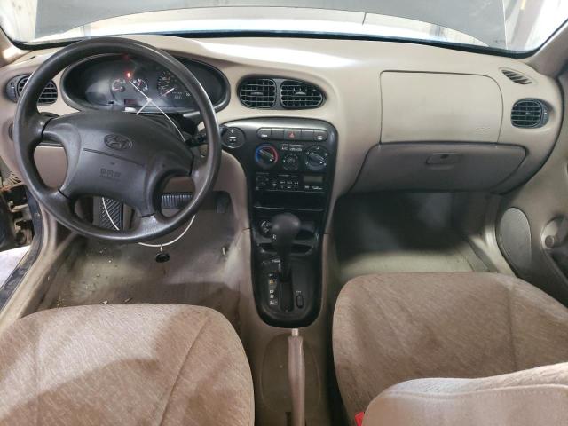 Photo 7 VIN: KMHJF25F7XU779715 - HYUNDAI ELANTRA 