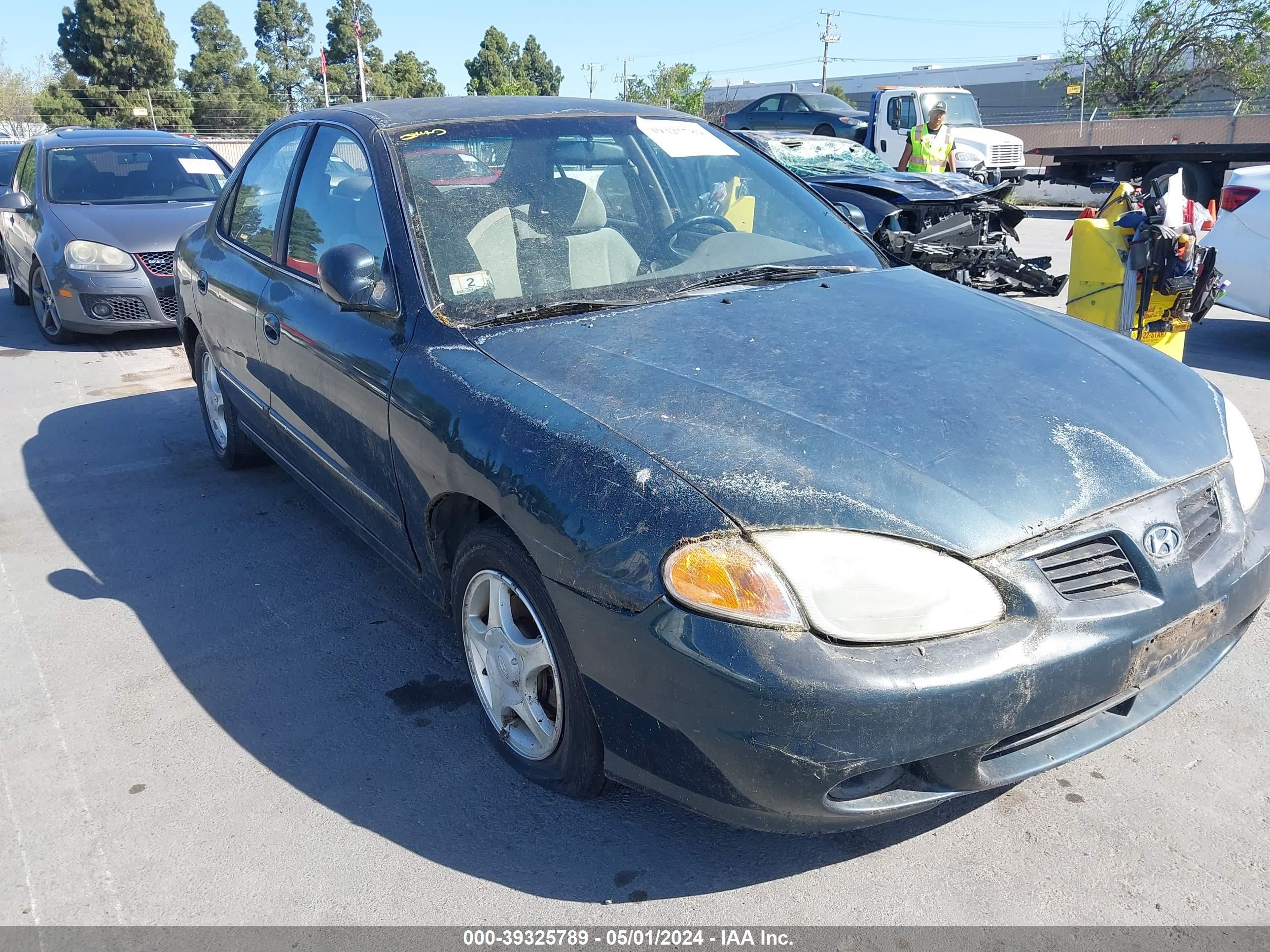 Photo 5 VIN: KMHJF35F0YU920468 - HYUNDAI ELANTRA 