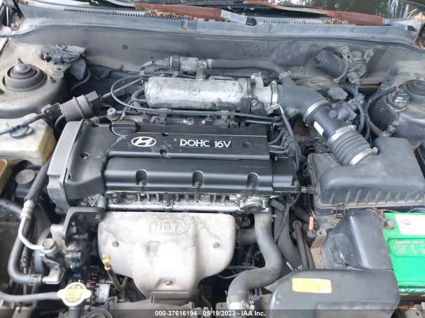 Photo 9 VIN: KMHJF35F1YU983904 - HYUNDAI ELANTRA 