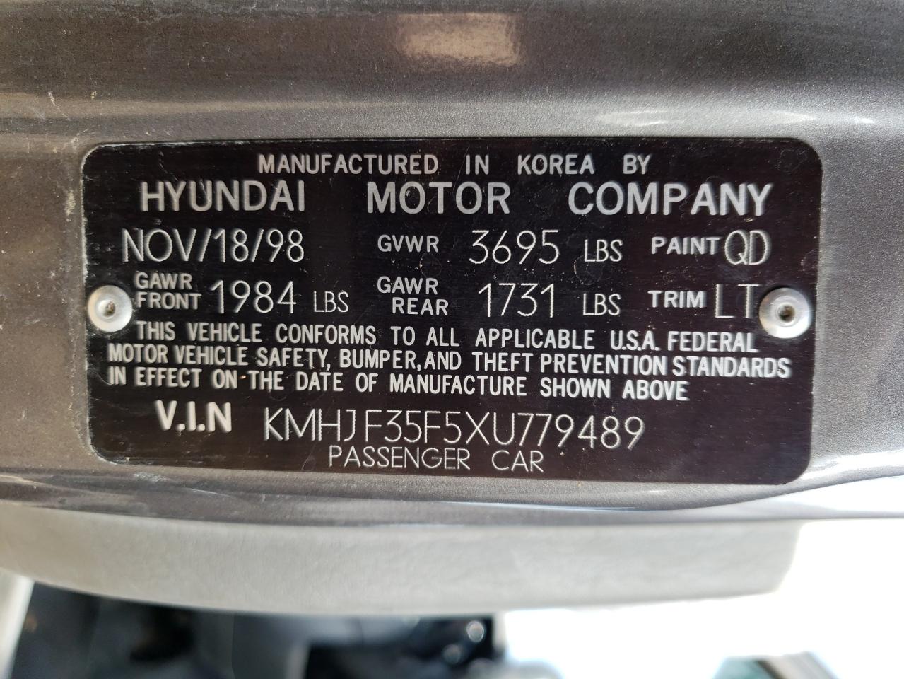 Photo 11 VIN: KMHJF35F5XU779489 - HYUNDAI ELANTRA 