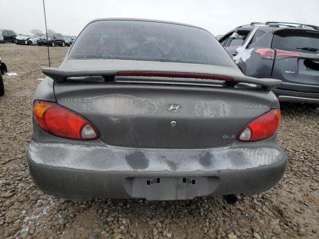 Photo 5 VIN: KMHJF35F7YU008338 - HYUNDAI ELANTRA 