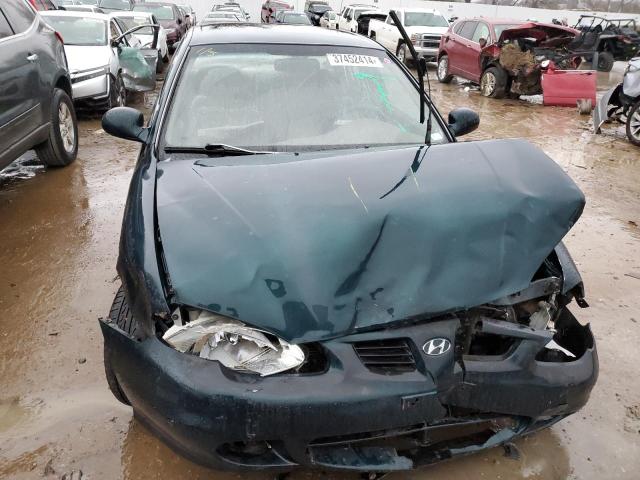 Photo 4 VIN: KMHJF35F8YU954979 - HYUNDAI ELANTRA 