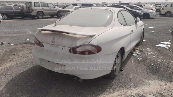 Photo 5 VIN: KMHJG31FPWU073446 - HYUNDAI COUPE 