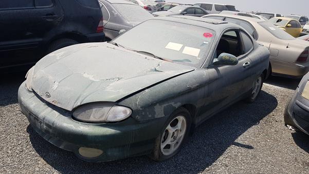 Photo 4 VIN: KMHJG31FPWU079363 - HYUNDAI COUPE 