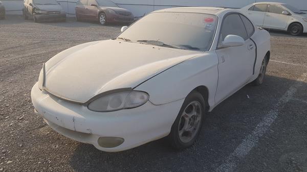 Photo 4 VIN: KMHJG31FPWU085312 - HYUNDAI COUPE 