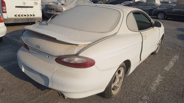 Photo 7 VIN: KMHJG31FPWU085312 - HYUNDAI COUPE 