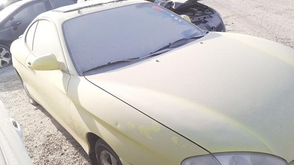 Photo 9 VIN: KMHJG31FPWU093347 - HYUNDAI COUPE 