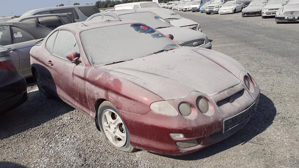 Photo 7 VIN: KMHJG31FPYU172658 - HYUNDAI COUPE 