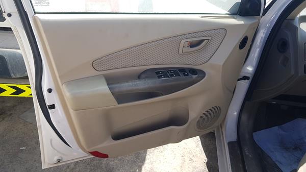 Photo 10 VIN: KMHJM81D79U981650 - HYUNDAI TUCSON 