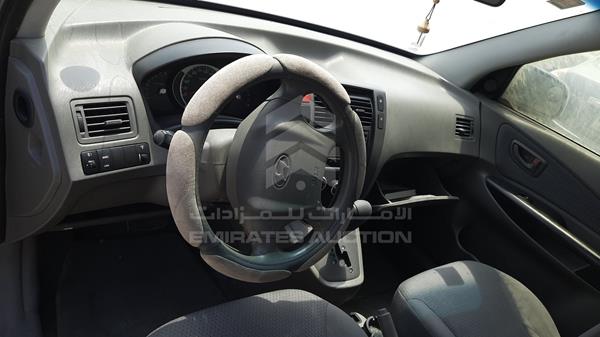 Photo 12 VIN: KMHJM81D89U995217 - HYUNDAI TUCSON 