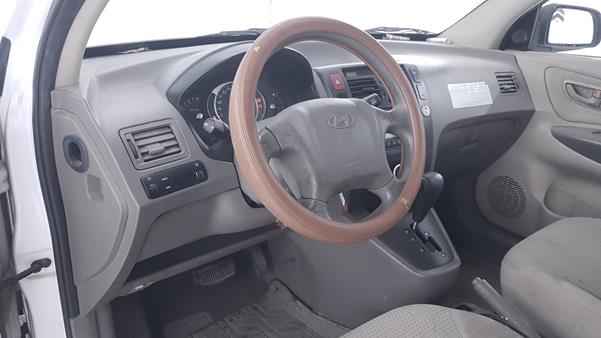 Photo 10 VIN: KMHJM81D99U981570 - HYUNDAI TUCSON 