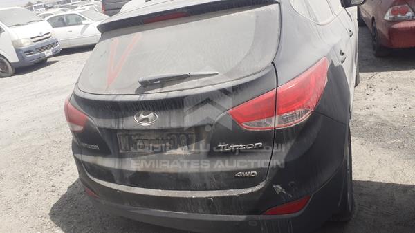 Photo 5 VIN: KMHJT81B1DU712621 - HYUNDAI TUCSON 