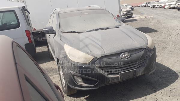 Photo 7 VIN: KMHJT81B1DU712621 - HYUNDAI TUCSON 