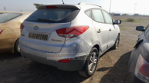 Photo 6 VIN: KMHJT81B2BU104605 - HYUNDAI TUCSON 