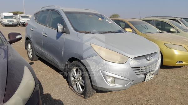 Photo 7 VIN: KMHJT81B2BU104605 - HYUNDAI TUCSON 